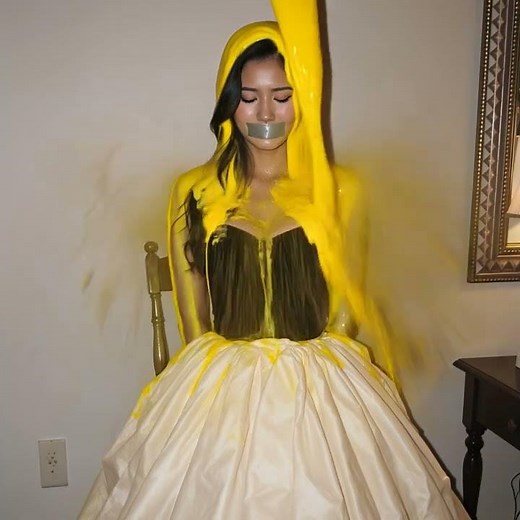 Girl that is tied, gets slimed.