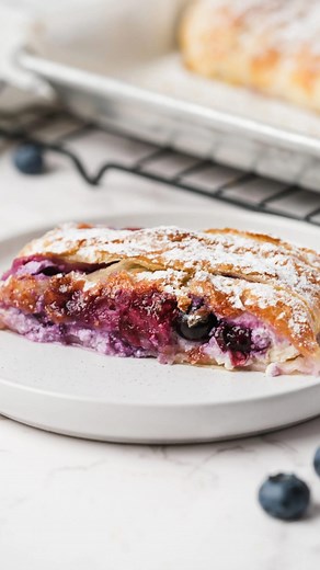 I’ve got the hacks to help you perfect this amazing flaky BLUEBERRY STRUDEL for #4thofjuly🇺🇸🇺🇸 TAP recipe link in bio https://reluctantentertainer.com/blueberry-strudel/ #blueberrystrudel #strudel #reluctantentertainer #blueberrydessert #summerblueberries | Reluctant Entertainer