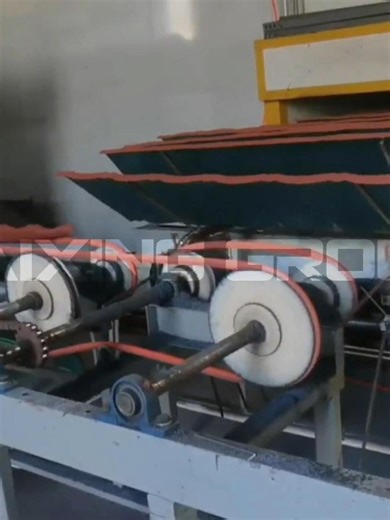 The “magic oven” for stone-coated tiles! 🔥 Watch the curing oven of a color stone coated roof production line in action: Substrates with wet glue & granules enter → Intelligent temperature-controlled baking → Coating fully melts → Granules permanently set! This is the secret behind weather resistance, anti-freeze, and color retention. Quality starts with curing on a color stone coated roof production line! #StoneCoatedTileLine #CuringProcess #RoofingManufacturing