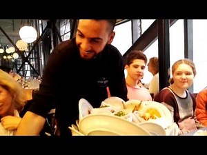 The best waiter in the world. Watch the most effective removing dishes from the table. Jaffa