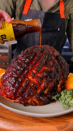 Our Honey & Brown Sugar Glazed Ham makes entertaining so easy 🔥 grab the full recipe and the Honey & Brown Sugar Glaze through the link below: https://www.traeger.com/recipes/honey-brown-sugar-glazed-ham | Traeger Grills