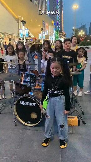 Engaging Outdoor Drum Performance by Kids