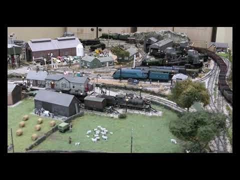 "City of Edingburgh" pulling weathered coal wagons in LMS Black.