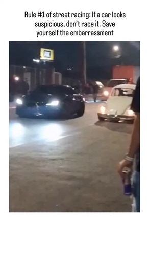 memeslolinfluence.vibe | The post showcases a viral video of a classic white Volkswagen Beetle, modified with a high-performance turbo engine, decisively beating a... | Instagram