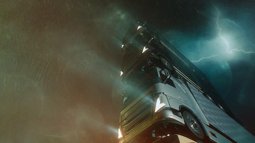 This is big! See the new Volvo FH, FH16, FM and FMX form a majestic tower. And on top of it: Roger Alm, our President. | Volvo Trucks