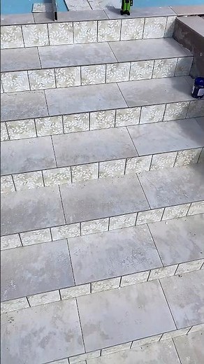 Porch tile with border and hand painted designs