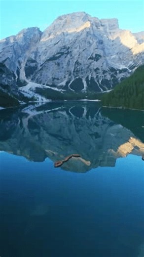 clip-3988670669-vertical-screen-lake-braies-italy-alpine-log
