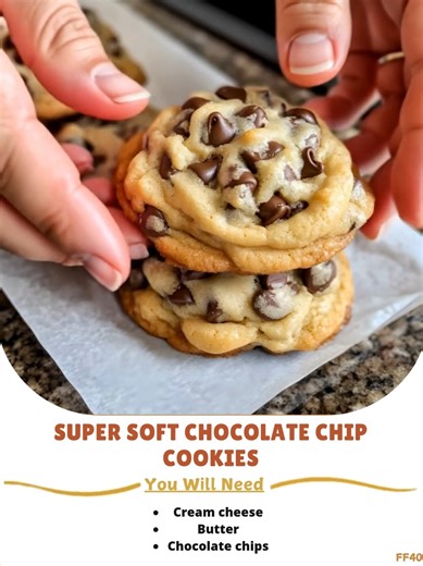 Super 🚀 Soft Chocolate Chip Cookies! The cream cheese adds a sweet, rich texture while also creating a gooey cookie that will leave you wanting more. **Ingredients** Cream cheese Butter Chocolate chips Brown sugar Granulated sugar Egg Vanilla extract Flour Cornstarch Baking soda ..... Full Recipe in Coʍmеոτ 💬 🐔 | Recipes Family Bites