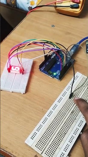 push button counter on 7 segment display