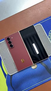 26K views · 100 reactions | Samsung W25 New Year red back film, very very beautiful! Ultra-thin back film does not hurt your | Trendy Tech Review | Facebook