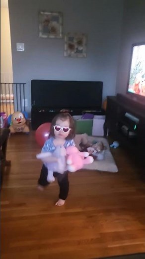 toddler dancing to Feist 1234 Sesame Street with her sunglasses and her babies #baby #shorts