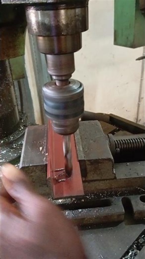 Boring a hole in an angle bar, using the pedestal drilling machine#fyp #goviral #education