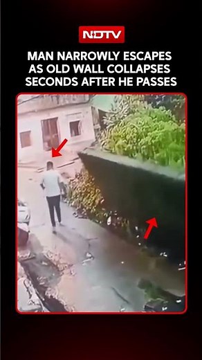 Man Narrowly Escapes As Old Wall Collapses Seconds After He Passes