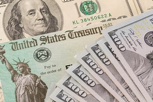 Here's what financial gurus say you should do with your $1,400 stimulus check