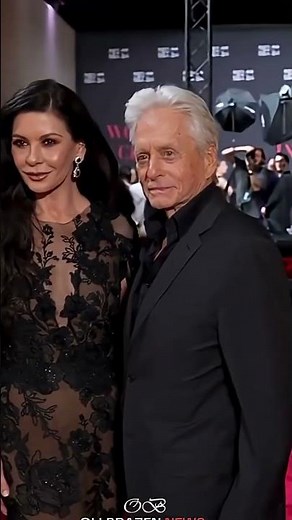 Michael Douglas & Catherine Zeta Jones Spark a Red Carpet Stir With One “Glance Exchange,” and Fans
