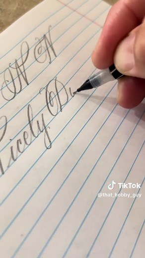 How to Write a Capital N in Cursive