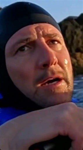 Seal Stabilizes Capsized Kayak and Pushes It to Safety