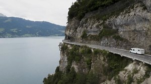 Camper Driving Along Cliffside Road Lake Stock Footage Video (100% Royalty-free) 3568315947 | Shutterstock