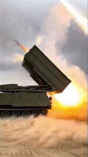 Ultra-realistic cinematic vertical video of a modern tracked multiple rocket launcher military