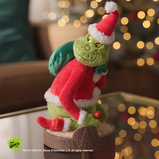 With 5 unique sound and light shows, the Dr. Seuss™ The Grinch Christmas Tree-Lighter makes the season a little Grinchy. https://bit.ly/3YxRP2x | Hallmark Gold Crown Stores