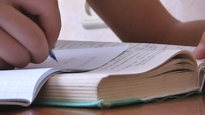 On The Table Lies A Thick Textbook, Homework, Textbook. Free Stock Video