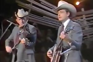 Bill Monroe - Y’all Come (1954) Bill Monroe's "Y’all Come" is a quintessential bluegrass song that captures the essence of communal spirit and Southern hospitality. Written by Arlie Duff and recorded by Monroe in the 1950s, it quickly became a hallmark of Monroe's performances and a staple in the bluegrass genre. The song's upbeat tempo, twanging mandolin, and spirited vocals exemplify the bluegrass style. The lyrics evoke scenes of front porch gatherings and family reunions, with the inviting r