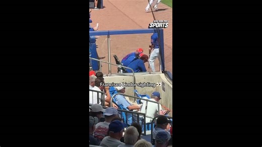 Francisco Lindor looks on with Kai Correa and Carlos Mendoza during Mets-Yankees