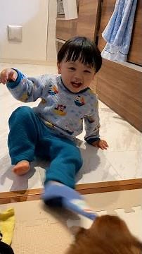 Funny Baby Playing with Dog
