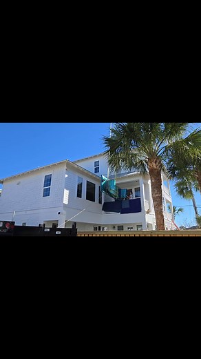 Fun Video 🎥 The Driftwood Beach House in Miramar Beach, FL boasts a stunning, custom-built, white oak 20-person dining room table. If you have stayed here, you may have wondered how we managed to install it. The answer is, of course, by crane! This beautiful rental property is now available for your Christmas vacation at the beach with the entire family. It accommodates 26 guests, is located 100 yards from the beach, and features a heated pool, new outdoor grill and griddle, EV charger, and mor