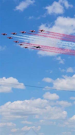 Tango doing a flypast with the RAF Red Arrows after his aerial display on the first day of The Royal International Air Tattoo #RIAT2024 #airtattoo #riat #RCAF100 #rafredarrows | Canadian Forces CF18 Demo Team