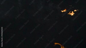 Ignition of a Combustible Mixture. A cloud of flammable substance flares up and burns in the dark