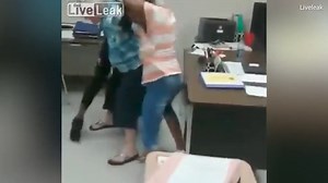 Teacher is repeatedly slapped during fight between students