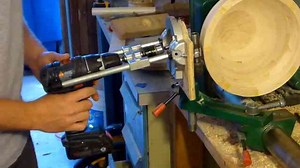 Watch as carefully arranged segments of maple and mahogany come together into a stunning bowl