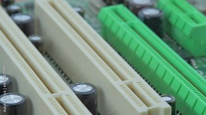 PCI Express contact pins on printed circuit board PCB surface. Computer hardware concept. Expansion slot