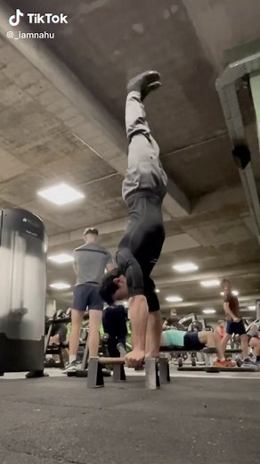Mastering Handstand Walks on Parallel Bars in the Gym