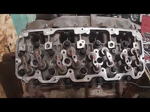 Installing valve bridges buttons and push tubes on 1 side of a Duramax engine