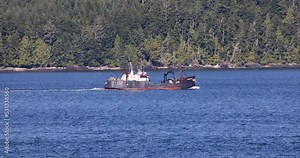 Inside passage Boat industrial Ketchikan Alaska. Coastal route for ships and boats. Network of island and channels. Prime fishing, boating and cruise ship destination.