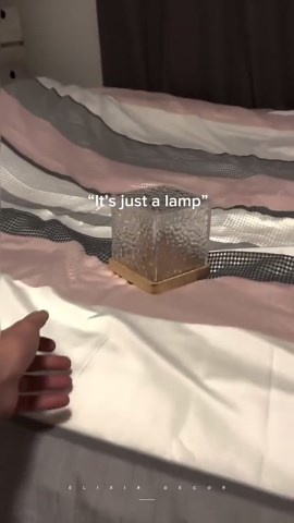 Transform any room with this dynamic water ripple lamp and create a calming ocean wave effect.