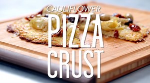 This cheesy cauliflower pizza crust is, dare we say it, even better than bread: http://ow.ly/LIw8Y | MyRecipes