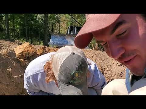 Part 2, installing water line in new pond dam construction.