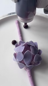 Blueberry flower dessert 💜 with Genoise sponge, #blueberry compote, blueberry vanilla ganache, vanilla ice cream quenelle and tempered chocolate 👌 made by @fred.csibilevin (Instagram) #dessert #pastry #pastrychef #sweet | Chef's Pencil