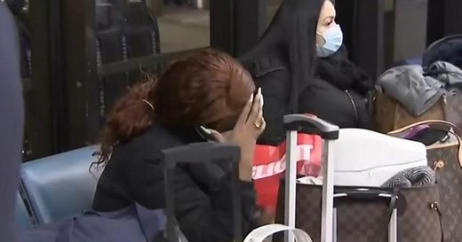 Omicron variant drives holiday COVID surge and flight cancellations