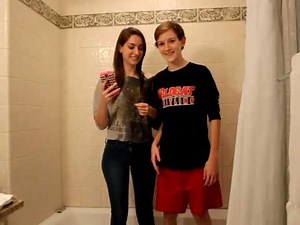 Wetlook, A girl takes a shower with her clothes on