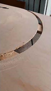 Cutting an arch with a router.