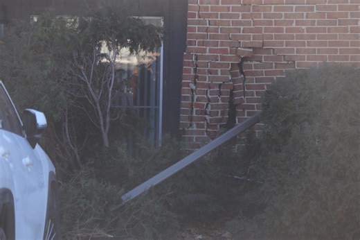 Driver hospitalized after crashing into Kettering apartment