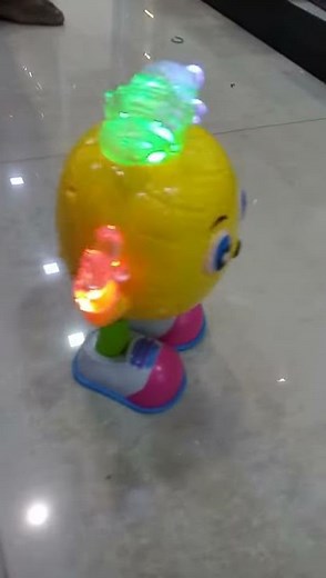 Dancing pineapple with music and lights toy