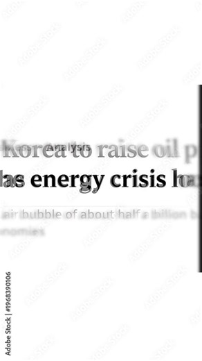 Vertical orientation of fast scrolling news articles and headlines focused on the global energy crisis, electricity costs, and financial security