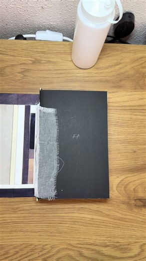 Glueing the textblock into the case Mistborn edition #encuadernacion #bookbinding #specialeditionbook #booktok #brandonsanderson