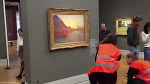 Two climate activists from the group Last Generation threw mashed potatoes at Claude Monet's painting, "Les Meules," on Sunday, while it was on display at Museum Barberini in Potsdam, Germany. The museum confirmed that the painting was not damaged in the incident. | CBS News