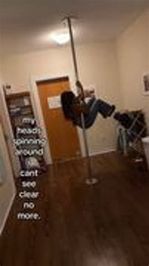 Woman Falls Along With Pole While Attempting Pole Dance